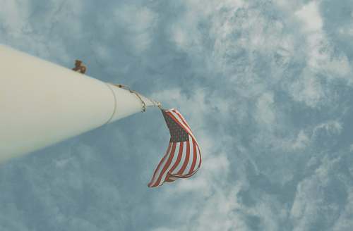 united states low angle photography of US Flag laguna beach